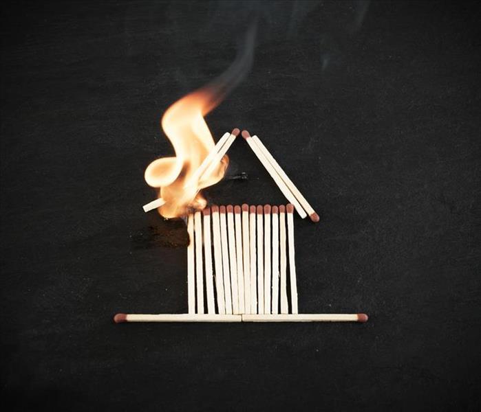 Matchstick house on fire