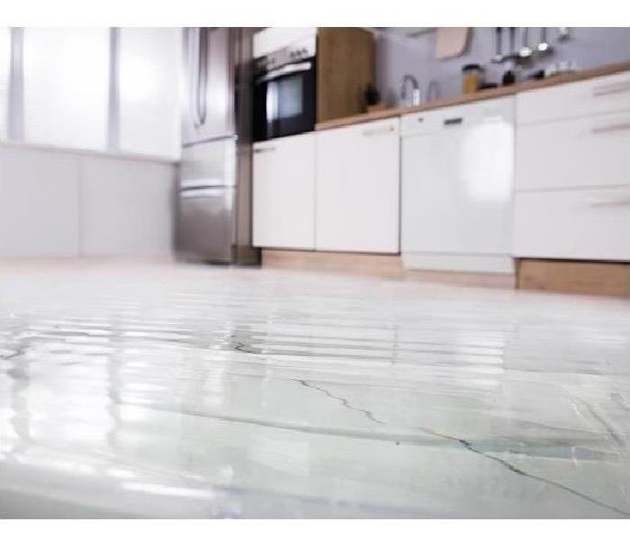 leak flooding kitchen floor